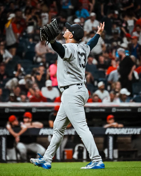 Fernando Cruz celebrates after securing the Yankees win.