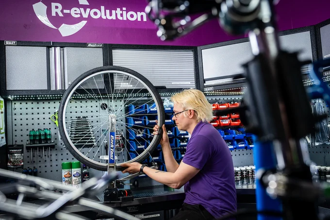 R-evolution mechanic, Jason Wigmore, working on a cycle repair.