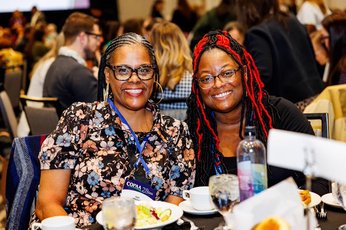 ALT - A picture of Dr. Destiny Huff & Oyin Jones Mitchell at the 28th Annual COPAA Conference.