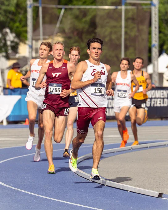 Runners competing on a blue track, with visible uniforms from Boston College, Virginia Tech, Princeton, and other institutions. The scene is at an outdoor athletics event with a "Track & Field" banner in the background.