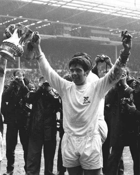 Bobby Hope, lifting the FA Cup for Albion.