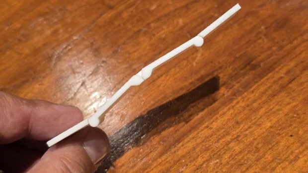 Showing maximum reverse deflection.