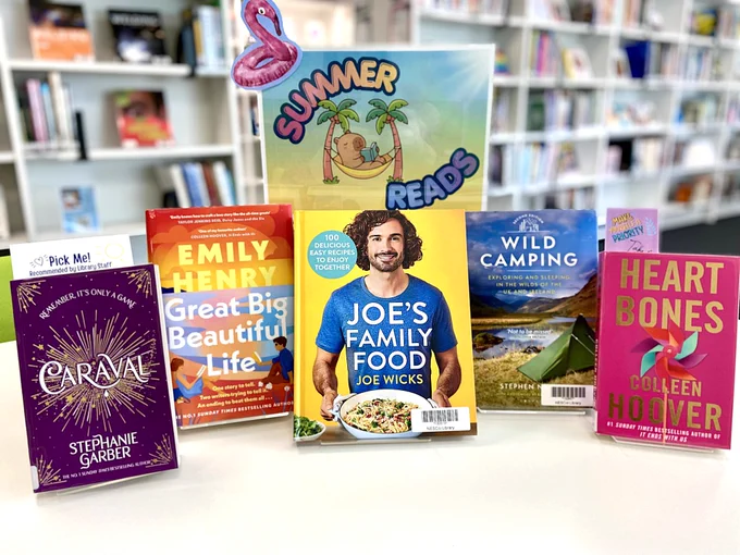 Some Summer themed books with the header Summer Reads.