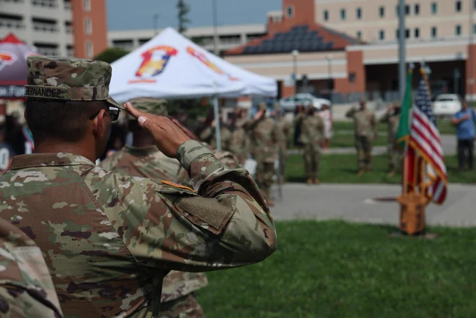 A Soldier salutes during the Intelligence and Sustainment Company, Headquarters and Headquarters Battalion, U.S. Army Southern European Task Force, Africa (SETAF-AF) change of responsibility ceremony 
