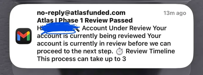 Screenshot of a congratulatory email from Atlas Funded confirming that I have successfully passed my Phase 1 evaluation account.
