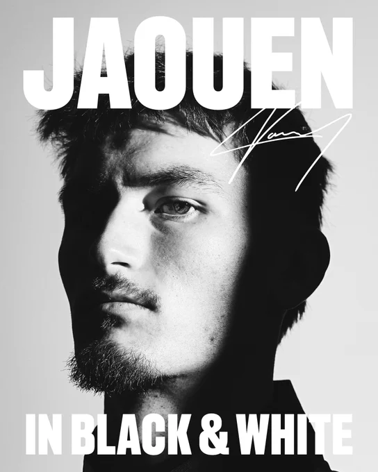Ewen Jaouen pictured in black and white after he signs for the club. 