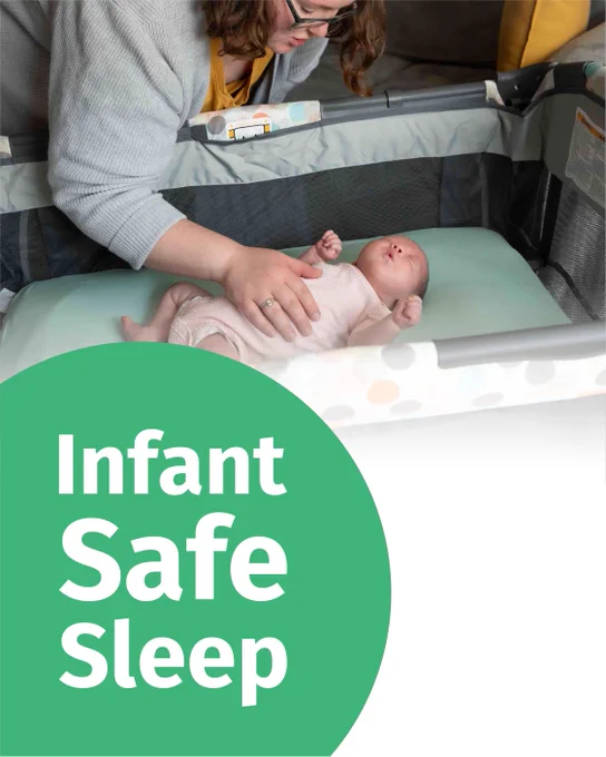 A caregiver gently places an infant in a crib. The image includes a green circle with the text "Infant Safe Sleep."
