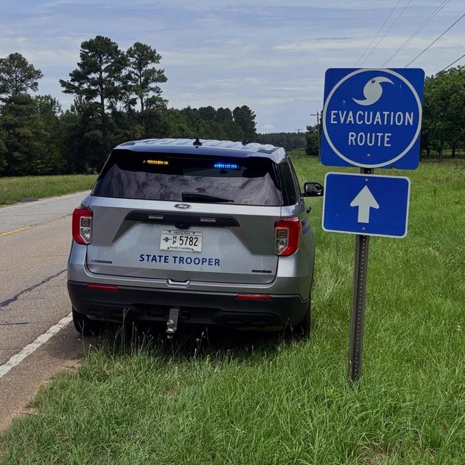 SC State Trooper car and Hurricane Evacuation Sign