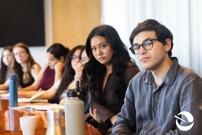 Executive Fellows listening intently