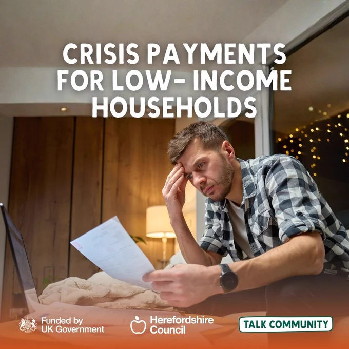 Man looking stressed at bills, with text about crisis payments for low-income households.