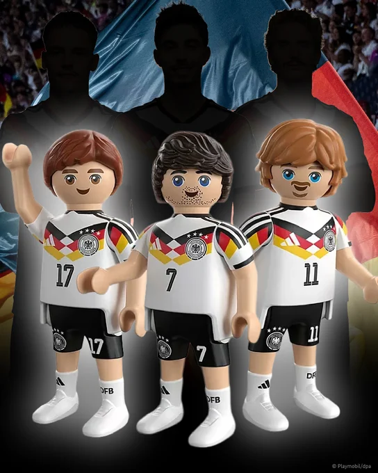 Three Playmobil figures of Germany players with three silhouettes in the background