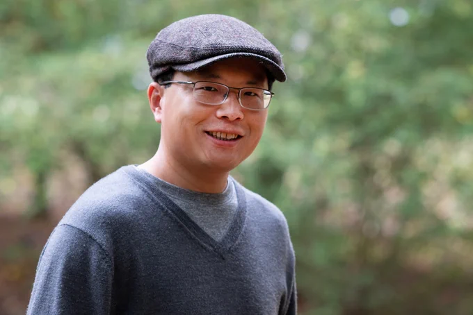 headshot of John Zhu