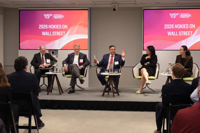 A panel of alumni and industry professionals speaks with students and alumni during Pamplin College of Business's Hokies on Wall Street program in New York City