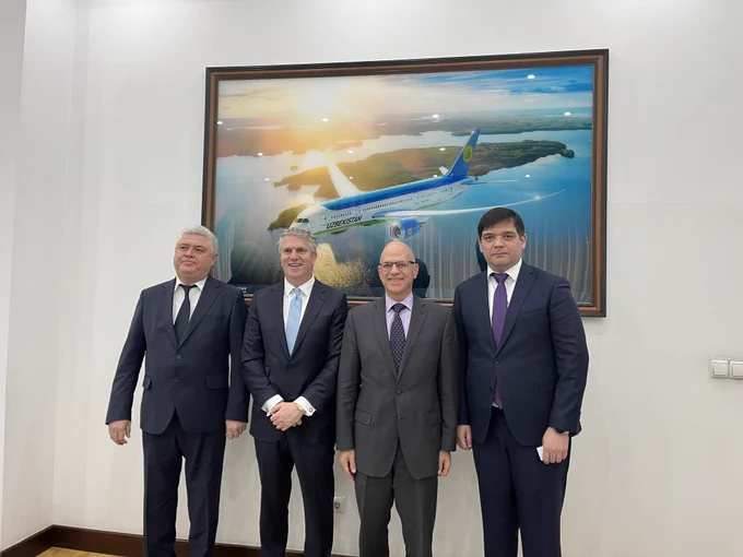 Group photo featuring Assistant Secretary Fogel.