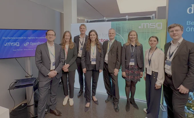 Representatives from msg and OpenProject gathered for a group photo following the announcement of their partnership at the Zukunftskongress Staat & Verwaltung 2026 in Berlin.