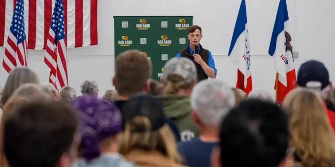 A photo of Rob Sand speaking to the crowd during his 2025 Town Hall Tour stop in Decorah.