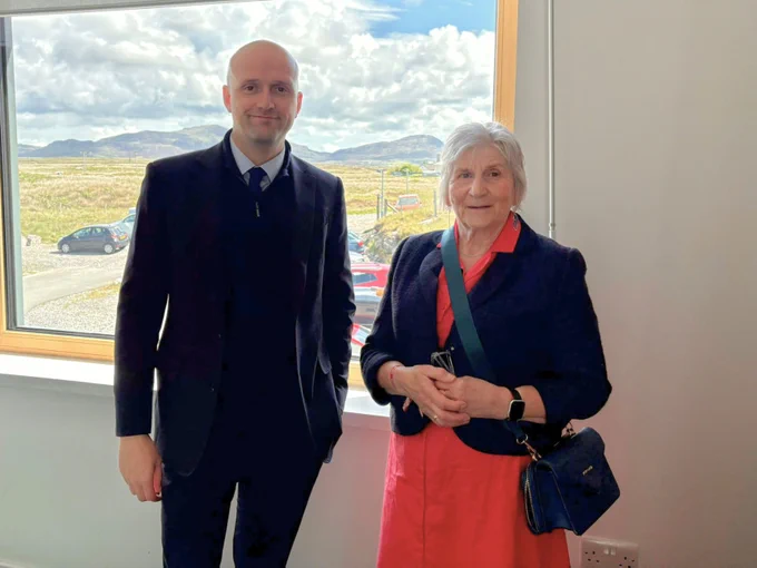 Transport Secretary Stephen Flynn poses for a photo with Chair of the Ferries Community Board Mary MacInnes.