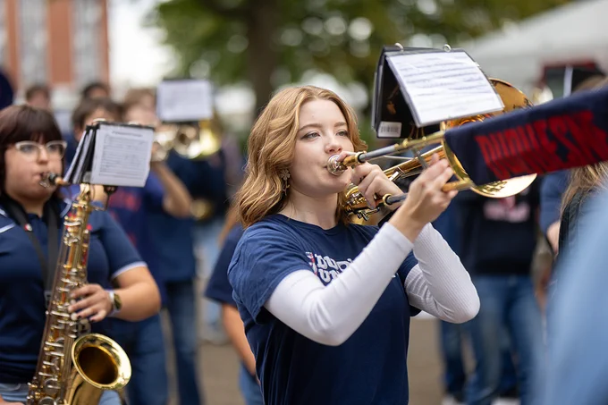 Skyler plays the trombone with the Pep Band during the Rally to Rooney at Homecoming & Family Weekend. 