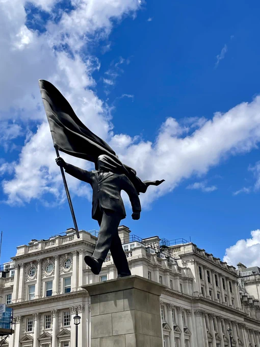 Banksy’s flag statue in Waterloo Place, London