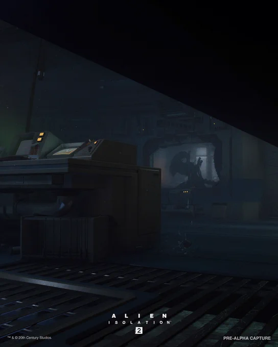 The interior of what looks like a spaceship, from the point of view of a person hiding under a desk. It's dark, but we can see the silhouette of an Alien behind a window in the background.