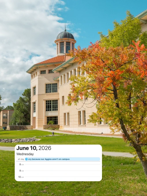A beautiful campus scene on a sunny day, featuring SKeen Hall with a dome and distinctive architecture. In the foreground, a tree with vibrant autumn leaves adds a pop of color to the lush green lawn. The sky is blue with scattered clouds. A digital calendar at the bottom highlights Wednesday, June 10, 2026, with a note for the whole day saying, "cry because our Aggies aren't on campus."