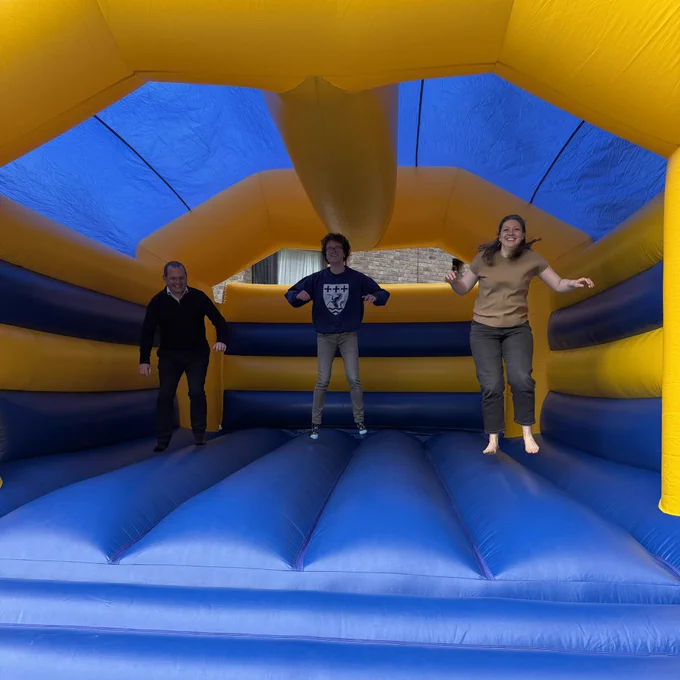 The College Officers and JCR President enjoy the bouncey castle