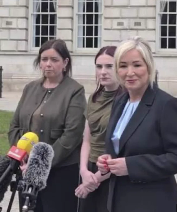 Image is a photo of SF reps at press conference.
