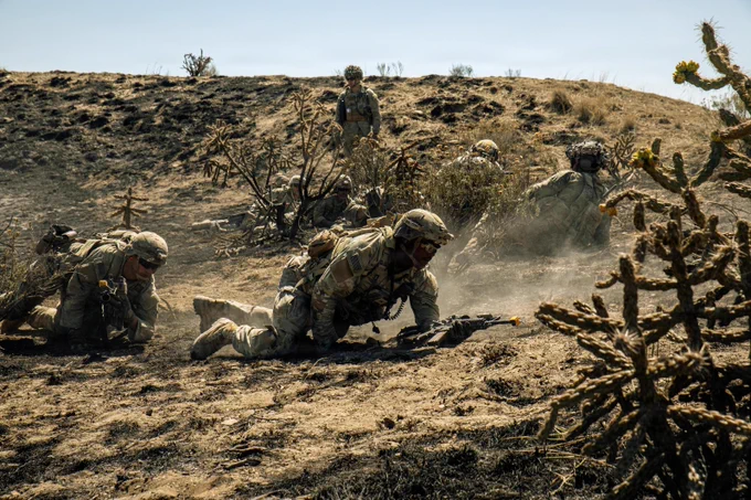 Soldiers with 1-41 IN, 2SBCT, 4ID moved through a combined arms live-fire exercise during Ivy Mass at Pi\u00F1on Canyon Maneuver Site, Colorado.