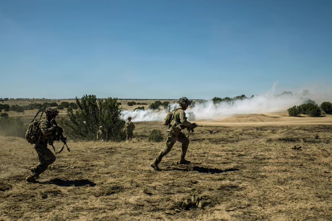 Soldiers with 1-41 IN, 2SBCT, 4ID moved through a combined arms live-fire exercise during Ivy Mass at Pi\u00F1on Canyon Maneuver Site, Colorado.