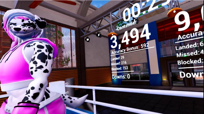 In between rounds as break starts. Ashley the Dalmatian shoots the view a smug grin as she walks back to the corner. Ashley is wearing a pink crop-top hoodie, pink shorts and has pink hair tips. 

The player's score reads 3,494 with 29 punches land 216 missed. 
Ashley's score: 9674, 64 punches landed, 4 missed. 