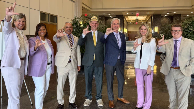 LSU System Staff pose for a photo after the June Board Meeting.