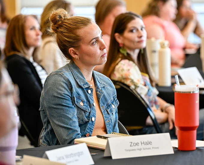 Timpview High School teacher Zoe Hale listens to instruction at the June 8–10 regional civics training at Utah Valley University provided by the Center for Constitutional Studies.