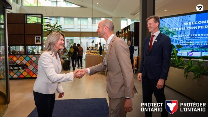 Photo of Minister Dunlop at the Information Systems for Crises Response and Management Conference