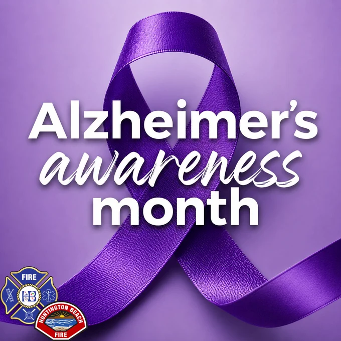 A purple awareness ribbon is displayed against a soft purple background with the words "Alzheimer's Awareness Month" in large white lettering. The Huntington Beach Fire Department logo appears in the lower left corner, recognizing June as Alzheimer's & Brain Awareness Month and promoting awareness of Alzheimer's disease and other forms of dementia.