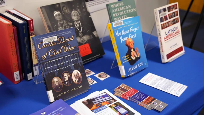 Pictured is a photo that shows books that talk about American history. 