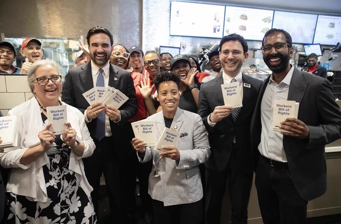 Mayor Mamdani, D C W P Commissioner Levine and New York City Council Members share workers’ rights literature with Chick Fil A workers. 