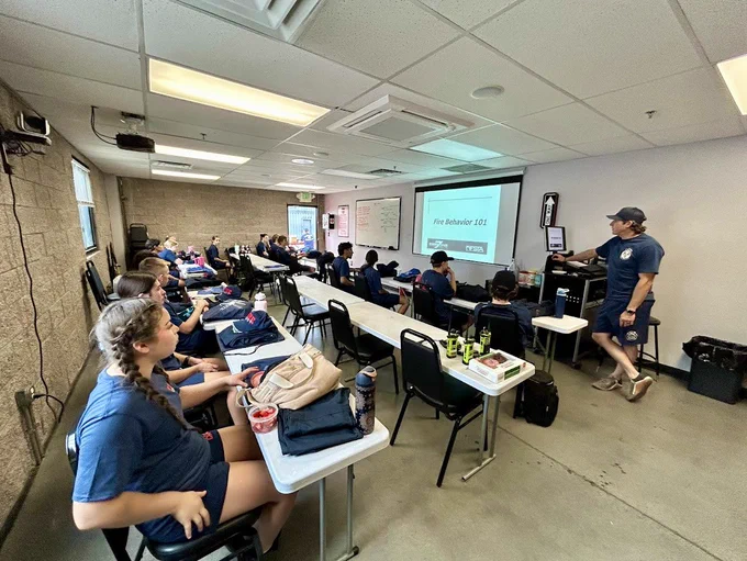 Daytime image of a group of teens in a classroom
