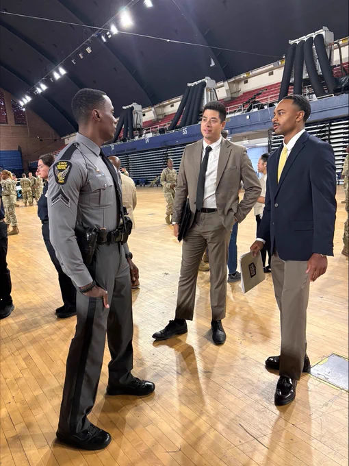 Trooper Lawrence speaks with soldiers at the District of Columbia National Guard Armory Annual Career Fair for Law Enforcement. 