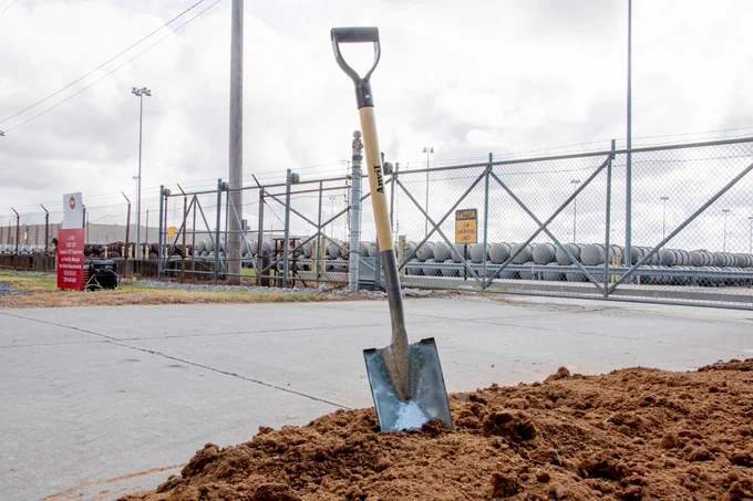 A shovel planted at the ground breaking ceremony