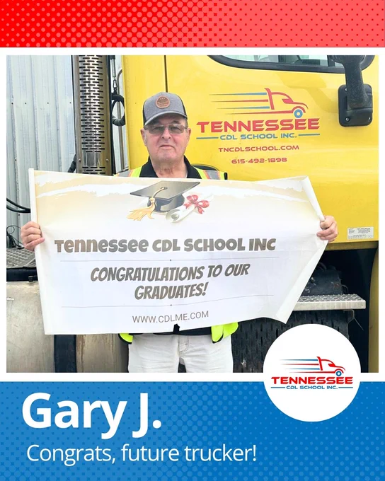 Graduate holding a congratulatory banner in front of a yellow Tennessee CDL School truck celebrating trucking school completion.