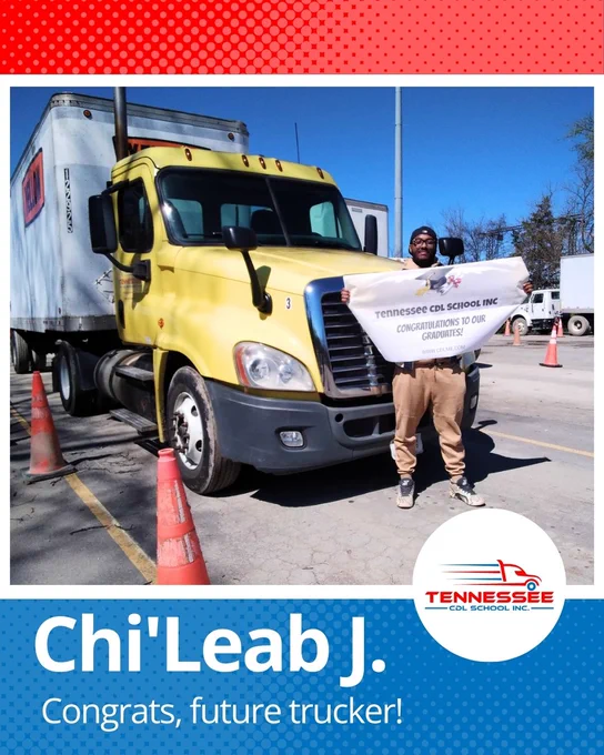 A man stands proudly in front of a yellow semi-truck holding a banner congratulating graduates from Tennessee CDL School Inc.
