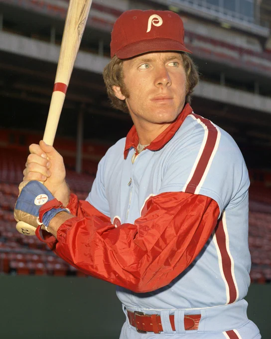 Batting portrait of Mike Schmidt in his right-handed stance wearing long red sleeves underneath a powder blue Philadelphia uniform. (Doug McWilliams/National Baseball Hall of Fame and Museum)