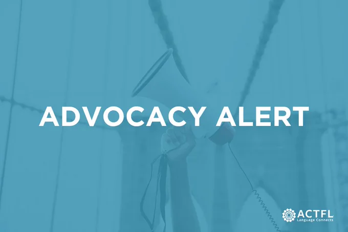 A person holds a megaphone aloft in front of a bridge backdrop. The image has a blue overlay with the text "Advocacy Alert" in bold white letters. The ACTFL logo and the text "Language Connects" are in the bottom right corner.