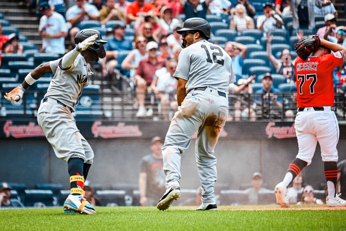 Jazz Chisholm Jr. and Trent Grisham celebrate Trent scoring a run.