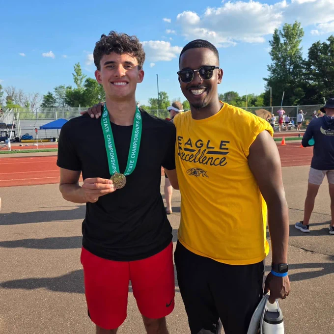 Photo of Braden Rhodes with medal