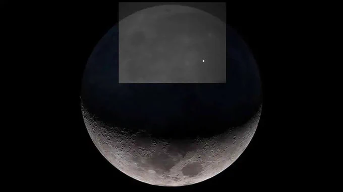 Two images of the Moon are superimposed. In the first, a dark quarter-Moon fills the bottom of the image, fading into black above, where the shadowed portion of the Moon is indistinguishable from the black of space. The second image appears as a rectangle in that black space. It shows a pale piece of Moon in mid-grey tones, with one bright white blotch, an impact flash, in the lower right.