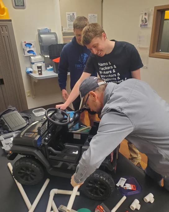 Dakota State students Josiah Copeland and Adam Zimmel joined Dr. Justin Blessinger and the team at LifeScape for a Go Baby Go! build day in Sioux Falls