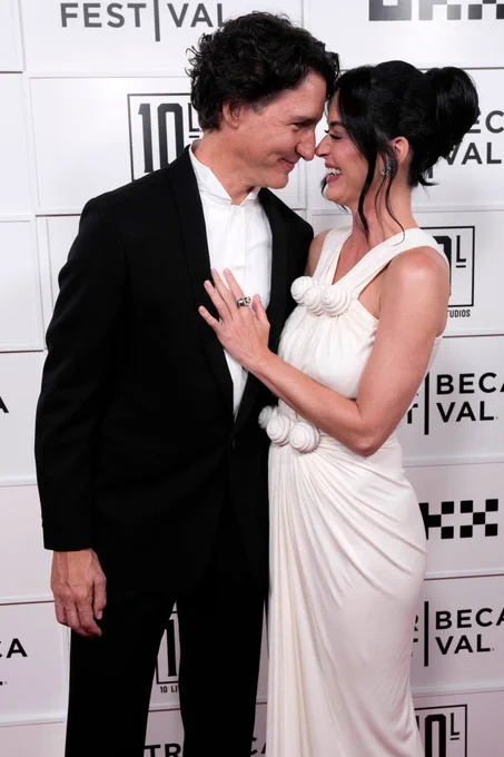 Justin Trudeau, left, and Katy Perry embrace at the world premiere of Katy Perry: The Lifetimes Tour – Live from Paris during the Tribeca Festival on Monday in New York. (Charles Sykes/The Associated Press)
