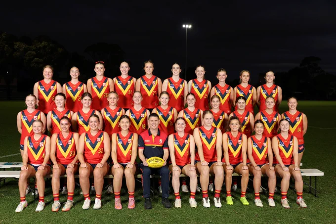 The 2026 AAMI SA U18 Girls squad with coach Brad Snell.