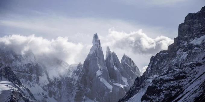 Background photo shows granite mountains.